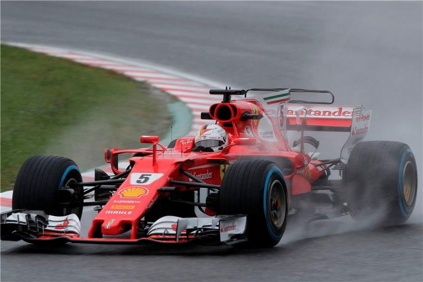 Hatte seinen Ferrari auf dem nassen Suzuka-Kurs sicher im Griff: Sebastian Vettel. Foto: afp