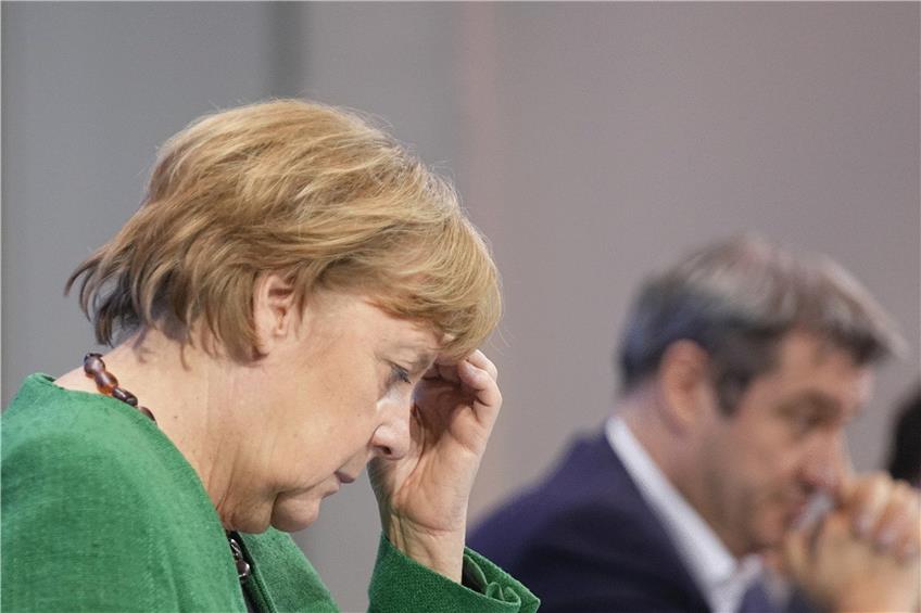 Kanzlerin Angela Merkel (CDU) stellte die Beschlüsse vor. Foto: Michael Kappeler/dpa