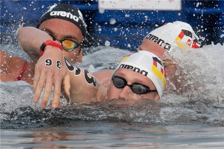 Nicht zu stoppen: Ausnahmeschwimmer Florian Wellbrock (vorne) hat dem deutschen Team mit seinem Sieg viel Sicherheit gegeben.  Foto: Bernd Thissen/dpa